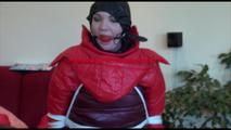 Jill tied, gagged and hooded on a chair wearing two downjackets for breath control play (Video)