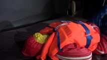 Watching Jill wearing a sexy shiny nylon rain pants and three shiny nylon rain jackets and a life jacket being tied and gagged and HOODED three times (Video)