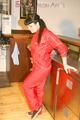 Jill posing sexy in an bar wearing sexy red shiny nylon rainwear (Pics)