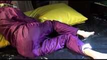 Get 2 Archivevideos with sonja enjoying Bondage in her shiny nylon Rainwear