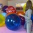 girlfriend pops your big balloons with wooden stick, fingernails and lighter