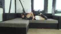 Ayu hogtied on couch 2/2