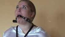 Sandra chairtied and drooling 2/2