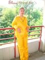 Leonie wearing a super sexy yellow rainwear combination posing outdoor (Pics)