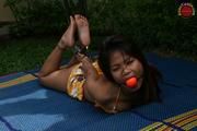 Asian Girl Handcuffed Incomfortably