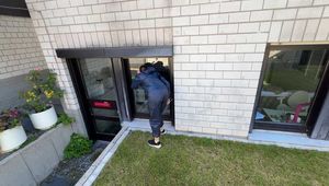 Rachel Adams bound and pantygagged in shiny nylon Rainwear