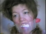 25 YR OLD CHARLENE IS CLEAR PLASTIC GAGGED, BALL-TIED, HOG-TIED, BLINDFOLDED, TAPE GAGGED & TIED TO AN EXERCISE MACHINE IN HER ATTIC (D54-6)