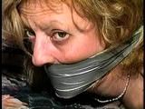 43 YEAR OLD WAITRESS IS TAPE HOG-TIED, BAREFOOT, TOE-TIED & WRAP TAPE GAGGED (D65-8)