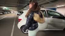 Marie bound and gagged in a shiny nylon Downjacket