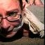 25 Yr OLD NEWS PAPER REPORTER IS MOUTH STUFFED, CLEAVE & HANDGAGGED  WEARING EYE GLASSES, BAREFOOT, TOE-TIED AND HOG-TIED WHILE LAYING ON THE FLOOR (D71-1)