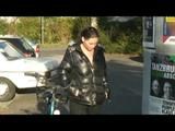 Enni riding the bicycle wearing a sexy shiny nylon shorts beneath the jeans and a downjacket on naked skin (Video)