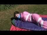 Watch 3 Archive Videos with Julia enjoying Bondage in shiny nylon Downwear.