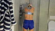 Myxxxy wetting her shiny nylon Shorts