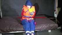 Watching Jill wearing a sexy shiny nylon rain pants and three shiny nylon rain jackets and a life jacket being tied and gagged and HOODED three times (Video)