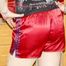 Mara putting on several shiny nylon shorts and posing infront of the camera (Pics)