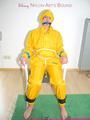 Katharina tied, gagged and hooded on a chair wearing sexy yellow rainwear (Pics)