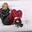 Samantha tied and gagged on a white sofa wearing a shiny red down pant and a black down jacket (Pics)