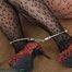 Hooters girl cuffed to the heater