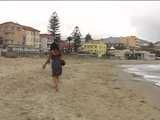 016157 Eve Takes A Discrete Pee On A Beached Boat