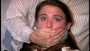 25 Yr OLD NEWS PAPER REPORTER GETS HANDGAGGED, MOUTH STUFFED, CLEAVE GAGGED, WRAP DUCT TAPE GAGGED, TAPE & ROPE BALL TIED, NYLON COVERED FEET AND TOE-TIED (D68-2)