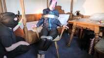 Rachel Adams bound, pantygagged and pantyhooded in shiny nylon Rainwear