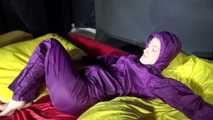Watching sexy Sonja weraing a sexy down skirt and a down jacket putting on a sexy purple rainsuit (Video)