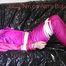Mara tied and gagged ob a black sofa wearing a supersexy pink downwear (Pics)