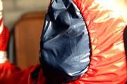 Katharina tied and gagged in shiny nylon rainwear