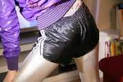 Mara during her workout wearing a sexy silber leggings and a nlack shiny nylon shorts over it as well as a purple rain jacket (Pics)