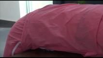Mara tied and gagged bending over an commode wearing shiny pink nylon rainwear (Video)