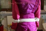 Mara tied and gagged ob a black sofa wearing a supersexy pink downwear (Pics)