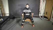Alice taped to a Chair and tapegagged in shiny nylon Downjacket