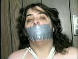 BIG.314 POUND BARBARA IS HANDGAGGED, MOUTH STUFFED, TAPE GAGGED & TIED WRISTS (D37-4)