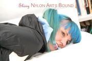Mara tied and gagged on a white sofa in a reading lounge wearing a sexy purple shorts with shadow stripes and a black rain jacket (Pics)