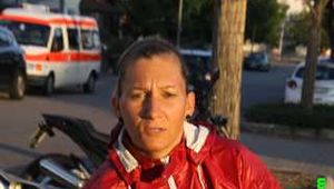 Watch Sandra enjoying her oldschool rainsuit outside on a very warm and sunny day