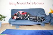 Jill tied and gagged wearing shiny nylon oldschool downwear (Pics)