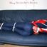 Katharina tied and gagged in a skisuit