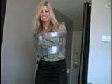  42 YEAR OLD LAWYER IS DUCT TAPE BALL-TIED, PANTIES STUFFED IN MOUTH, WRAP TAPE GAGGED, AND NYLON STOCKING TOES TAPED Pt3 (D57-3)