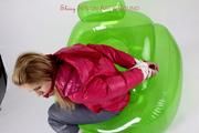 Samantha tied and gagged in a shiny nylon down jacket and nylon rainpants