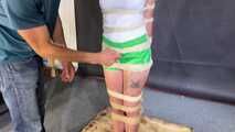 Beautifull Lola Montez tied and gagged very strictly to a post in shiny nylon Shorts