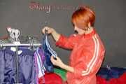 SONJA wearing a very special red shiny nylon jacket and a black shiny nylon pant sorting shiny nylon shorts (Pics)