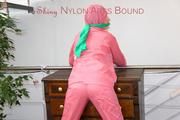 Mara tied and gagged bending over an commode wearing shiny nylon rainwear (Pics)