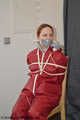 Lady Nadja hard bound and multiple gagged in AGU rainwear