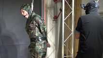 Ms Ungeniert tied and gagged in shiny nylon Rainwear 