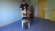 Shelli cuffed and gagged on a chair 1/2
