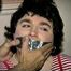 25 Yr OLD 2nd GRADE SCHOOL TEACHER GETS MOUTH STUFFED, TAPE GAGGED, BALL-TIED, HOG-TIED, WEARING A GIRDLE, TOE-TIED AND BLINDFOLDED ON THE FLOOR  (D65-12)