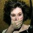 24 YEAR OLD ERICA IS HANDGAGGED, MOUTH STUFFED WITH PANTIES, SISTER HANDGAGGED, FEET TIED WITH NYLON STOCKINGS, HANDCUFFED & BALL-GAGGED (D57-5)