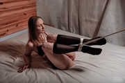 Nylon tied legs in seductive lingerie and skirt
