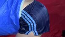 Watching sexy Sonja wearing a supersexy oldschool blue shiny nylon shorts and a lightblue rain jacket during her workout with barbells (Video)