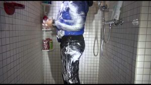 Watching Mara during her shower session with shaving foam and water wearing a sexy shiny nylon rain pants and a down jacket (Viedo)